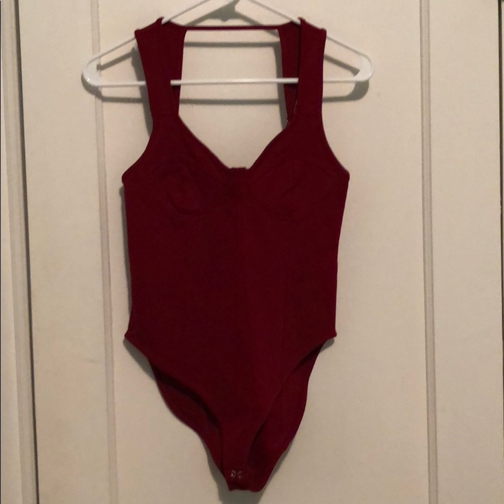 Red bodysuit.
